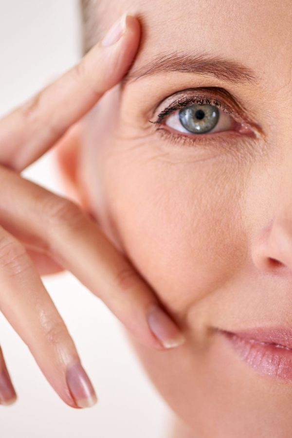 Closeup studio portrait of an attractive mature woman.
